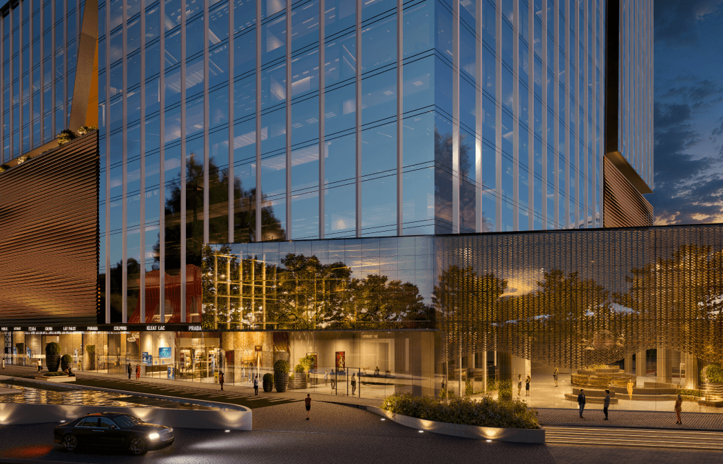 Arrival court and drop-off beneath the facade