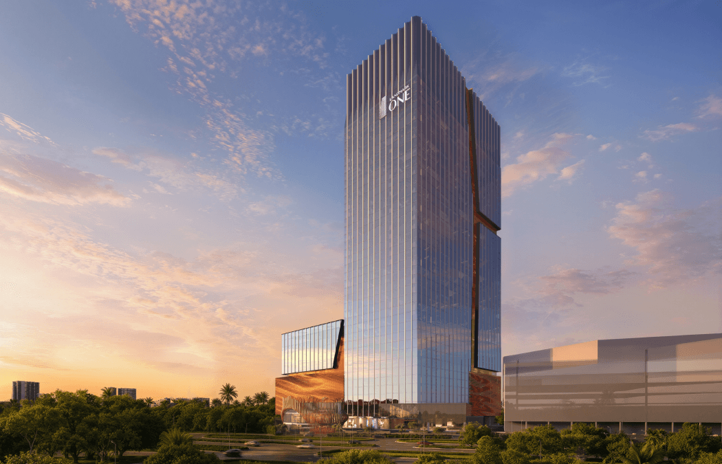 The tower at sunset with warm light across the facade
